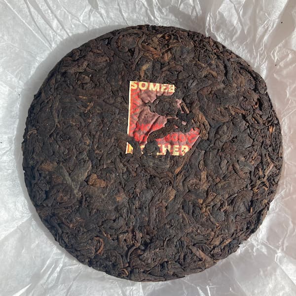 the un-wrapped tea cake, dark brown leaves